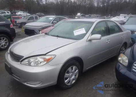 2002 Toyota Camry Le from USA, damaged, VIN 4T1BE32K92U011709